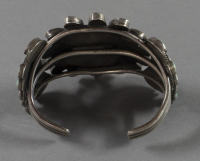 Zuni%20artist%2C%20%3Cb%3E%3Ci%3E%20Cluster%20Bracelet%3C%2Fi%3E%3C%2Fb%3E%2C%20ca.%201930%2C%20silver%20and%20turquoise%2C%20The%20Elizabeth%20Cole%20Butler%20Collection%2C%20no%20known%20copyright%20restrictions%2C%202012.92.156